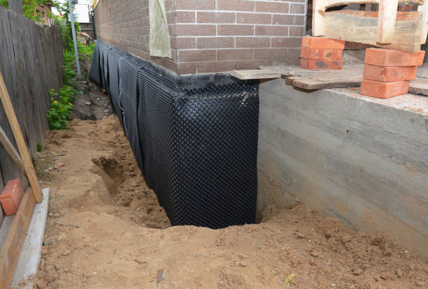 SJ Waterproofing Pros technician performing targeted Waterproofing assessment in Chesterton, IN